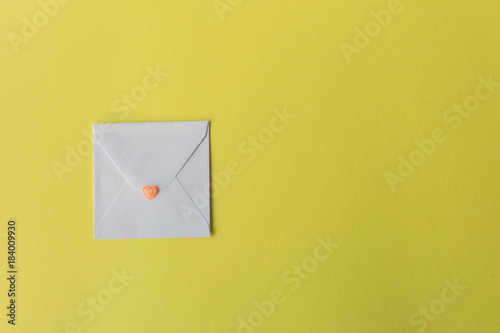 Envelope on yellow background