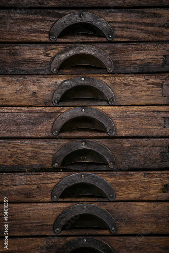Drawers of a vintage wooden chest photo