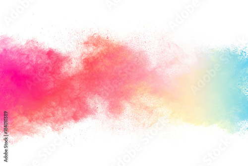 Multicolor powder explosion on white background. Colored cloud. Colorful dust explode. Paint Holi.