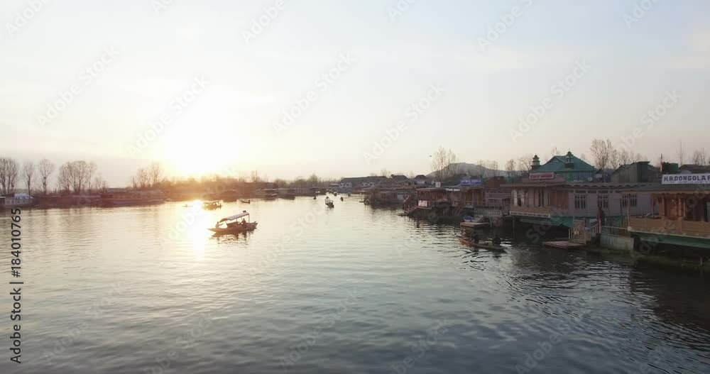 Aerial, sunset over scenic river in Srinagar Aerial, sunset over scenic river in Srinagar