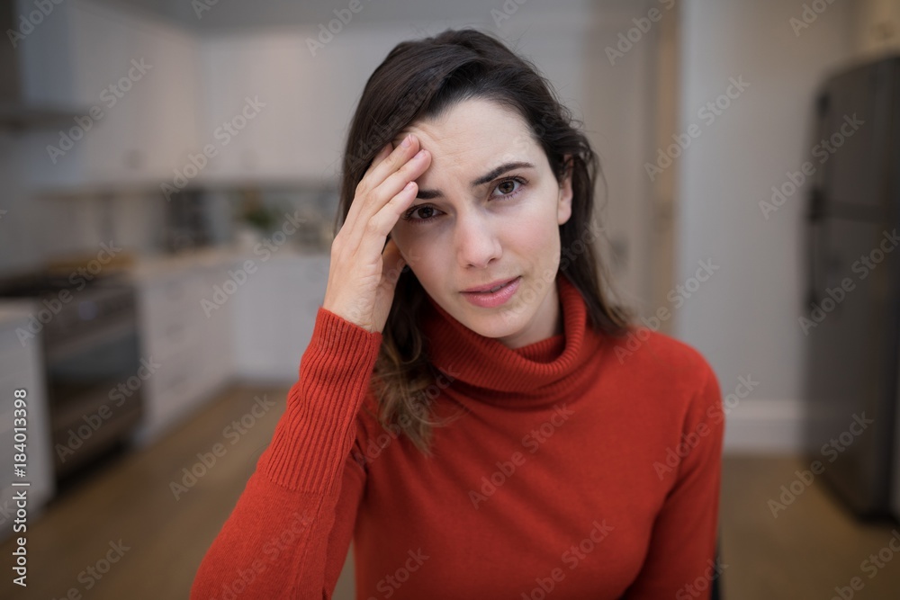 Obraz premium Portrait of beautiful woman suffering from headache