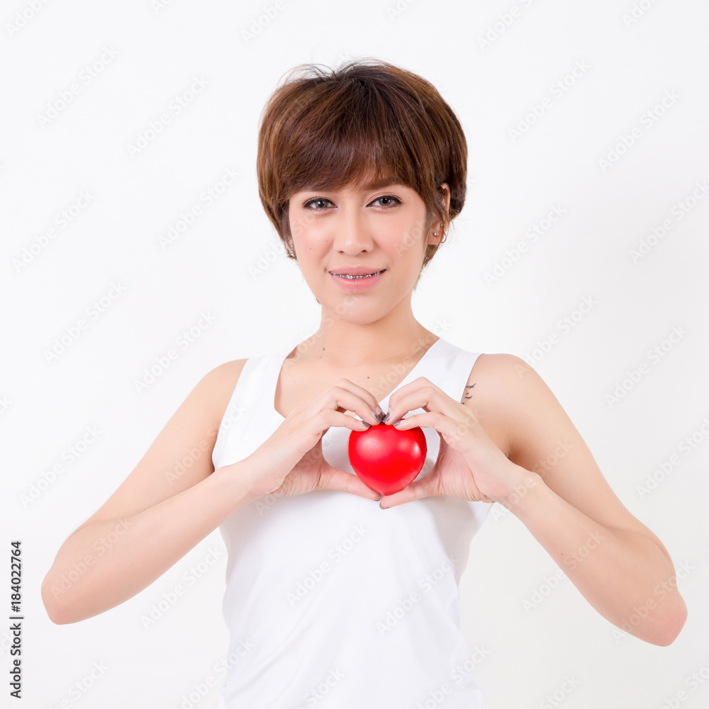 Beautiful young asia woman with red heart. Isolated on white background. Studio lighting. Concept for healthy. Beautiful young asia woman with red heart. Isolated on white background. Studio lighting. Concept for healthy.