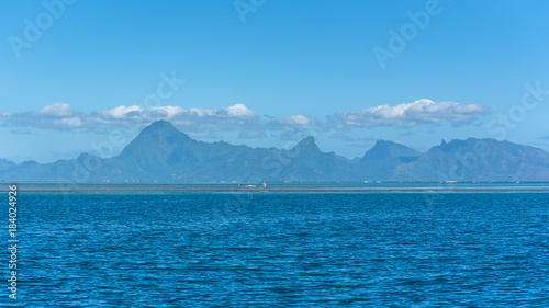 Tahiti in french Polynesia, beautiful panorama of the mountains from the lagoon, with the coral reef 