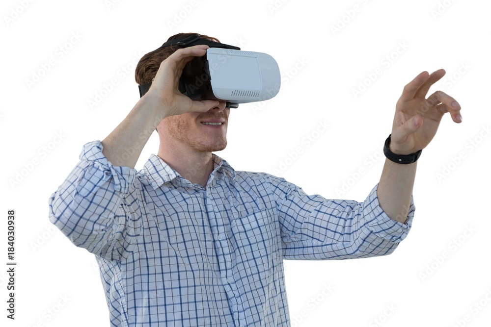 Male executive using virtual reality headset Male executive using virtual reality headset