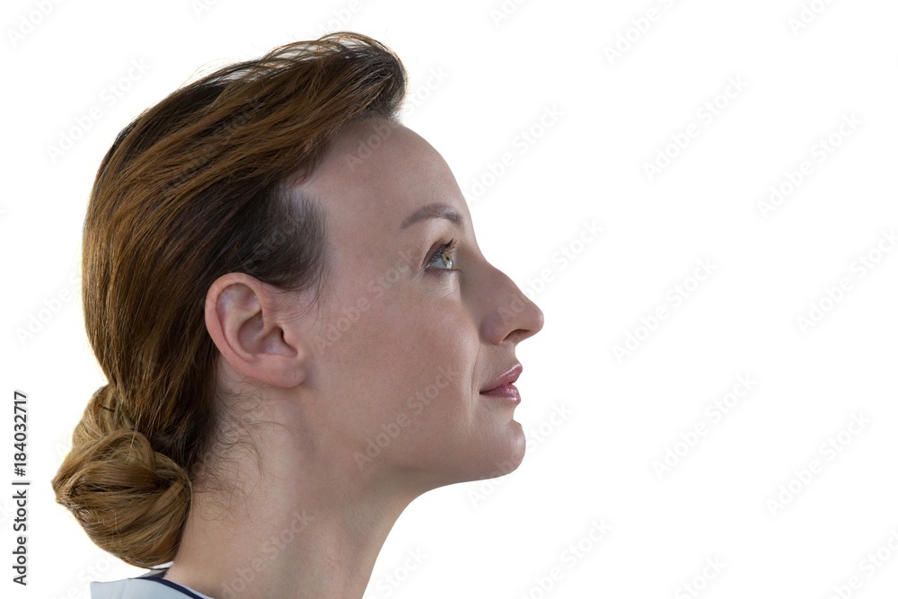 Female executive smiling against white background Female executive smiling against white background