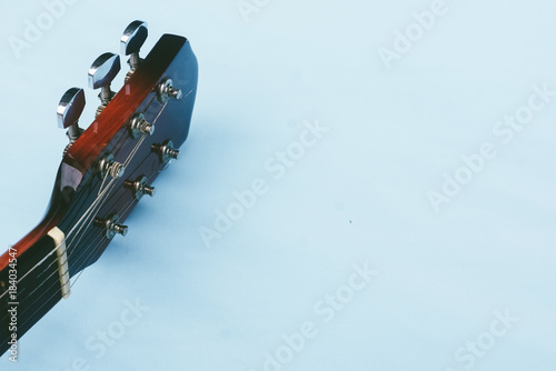 Acoustic Guitar Over Blue Background 