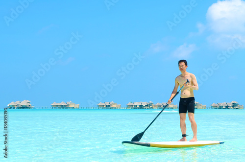paddle board at maldives island
