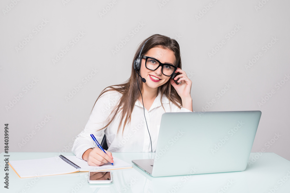 Customer support operator working in call center office Customer support operator working in call center office
