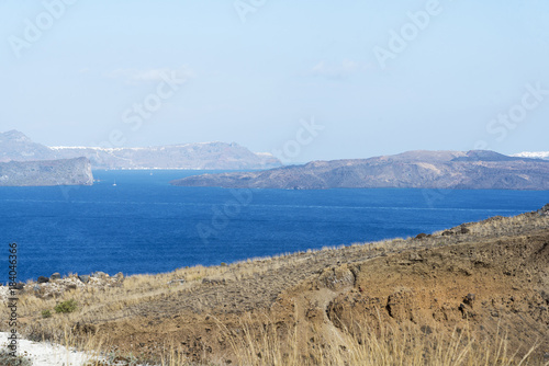 Sweeping landscape overlooking the island of Santorini, Greece photo