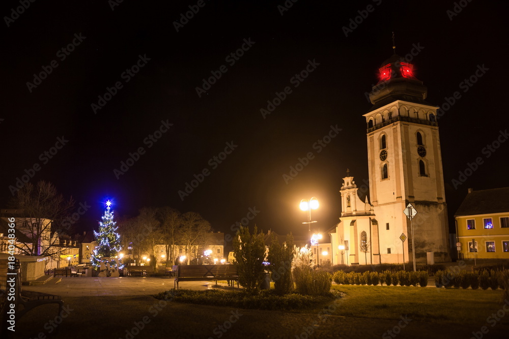 Night above historic center of Bechyne with christmas tree. Czech Republic.