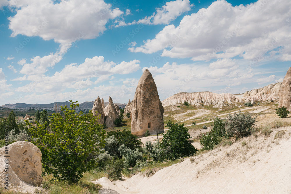 Beautiful view of the hills of Cappadocia. One of the sights of Turkey. Tourism, travel, beautiful landscapes, nature.