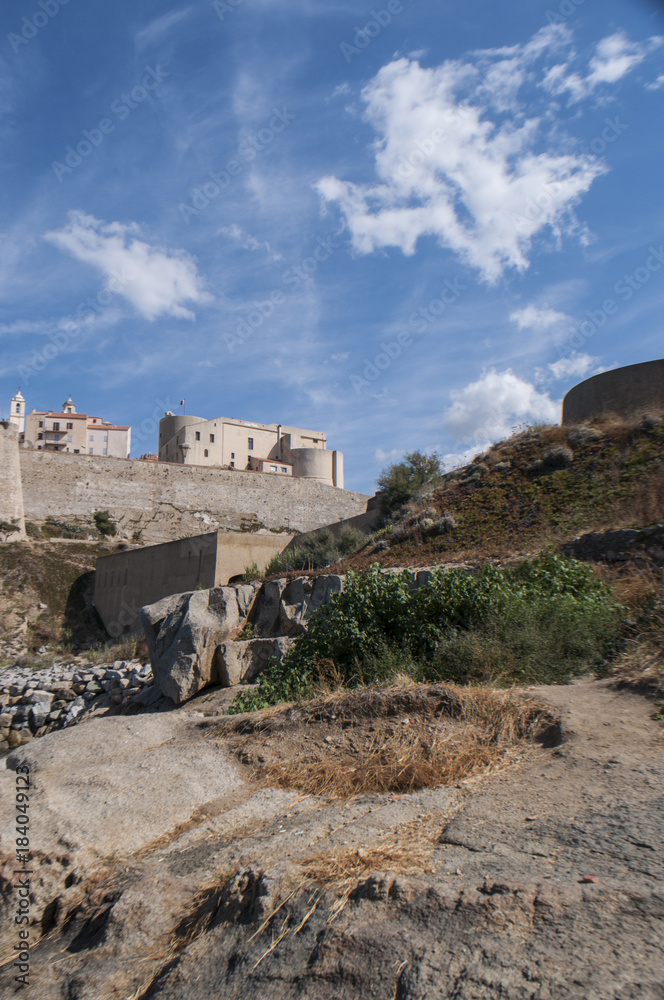 Corsica, 03/09/2017: vista dello skyline dell'antica Cittadella di Calvi, famosa meta turistica sulla costa nord ovest dell'isola, con le sue antiche mura e i campanili delle chiese