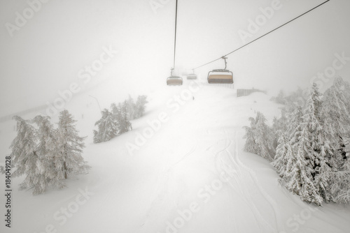 Fog and snowfall on ski resort © mahout