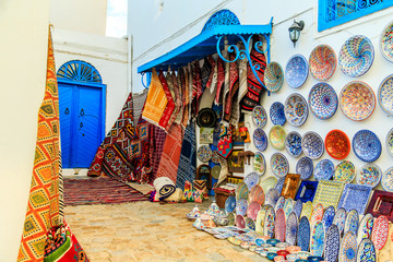 Fotobehang Tunesië Souvenirs en tapijten Tunesische markt  © lizavetta