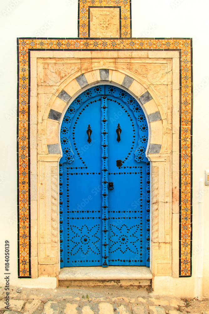 Naklejka premium Traditional blue door in Sidi Bou Said.