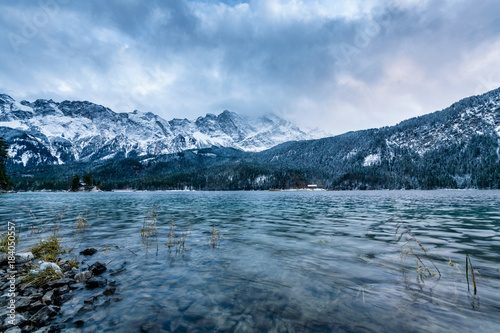 View of the famous Eibsee with alpine mountains in the background