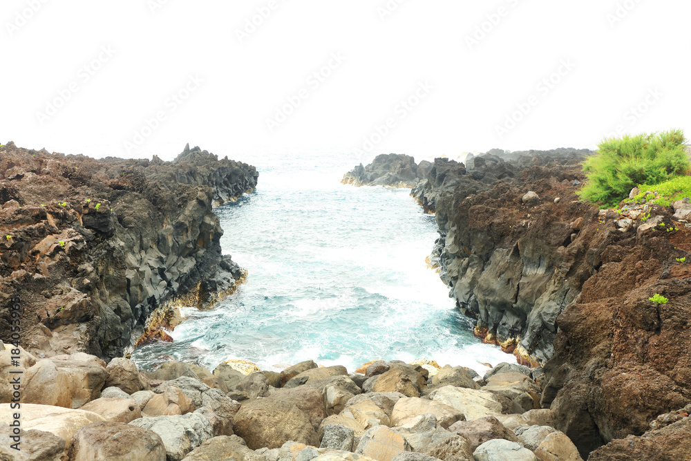 Volcanic rocks on the Atlantic Ocean Coast, Flores Island, Azores, Portugal