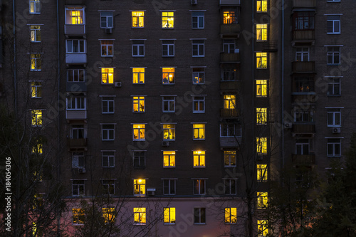 Illuminated windows of dwelling house