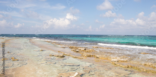 Various shades of blue in the blissful waters of the atlantic ocean at the island of San Andres photo