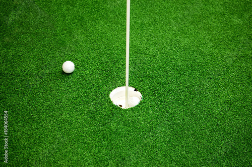 Golf balls on the green field