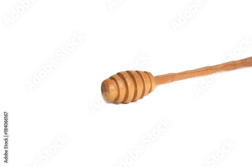 Wooden spoon for honey isolated on the white