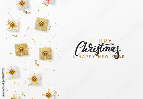 Merry Christmas greeting card. Xmas holiday background, gift box with gold tinsel, bright glitter confetti and golden serpentine.