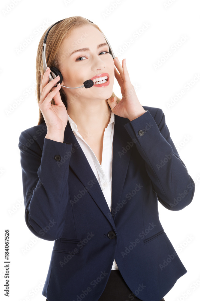 Beautiful caucasian business woman at call center. Beautiful caucasian business woman at call center.