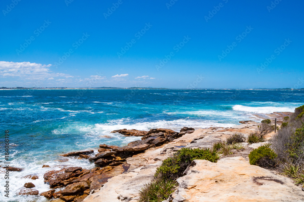 Picturesque coastal landscape with ocean, sea and rocks