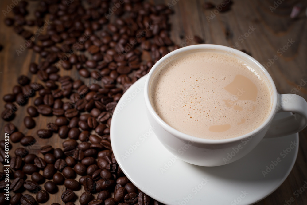 Fototapeta premium coffee latte with coffee beans