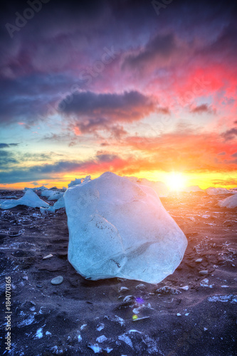 Beautiful sunset over huge ice cube, Iceland