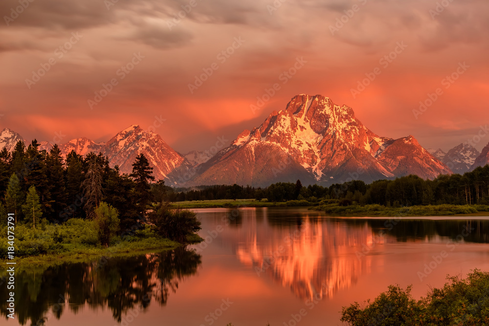 Mountains in Grand Teton National Park at sunrise. Oxbow Bend on the Snake River.