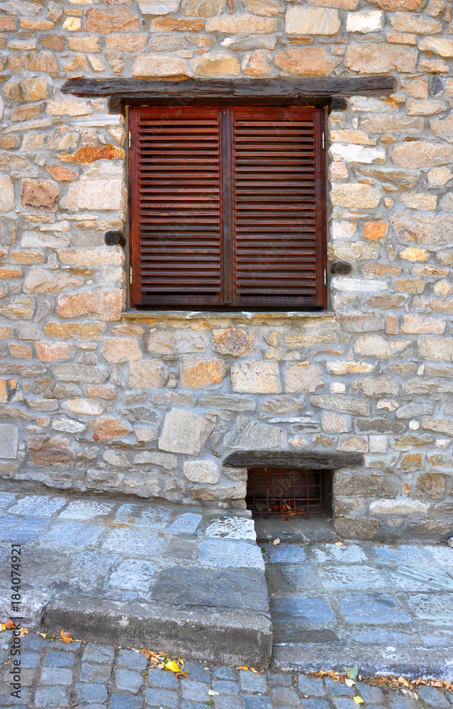 wall of the old stone house with window for your design wall of the old stone house with window for your design