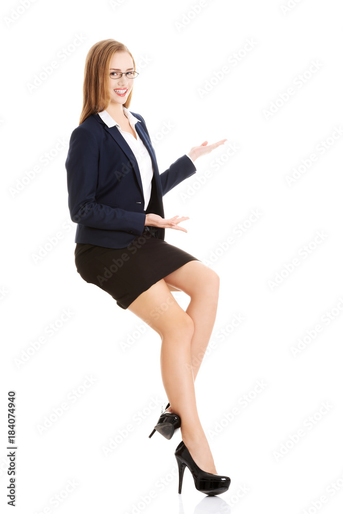 Beautiful caucasian business woman is making a presentation. Beautiful caucasian business woman is making a presentation.