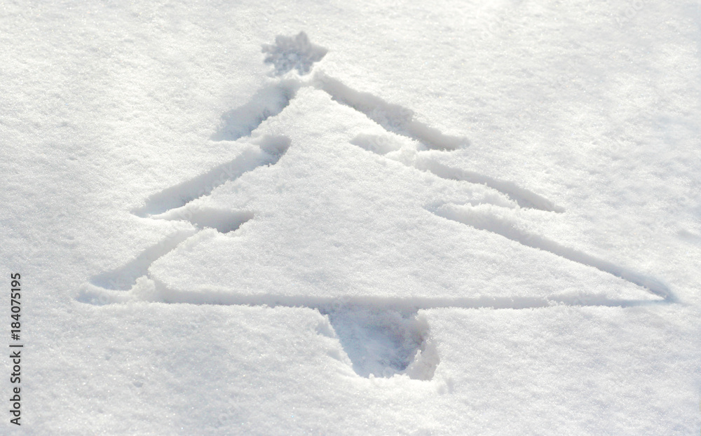 Christmas tree drawn in snow