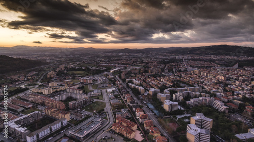 ITALY, Pesaro December 2017 - aerial view of the city with stormy houses, streets, hills and storm clouds