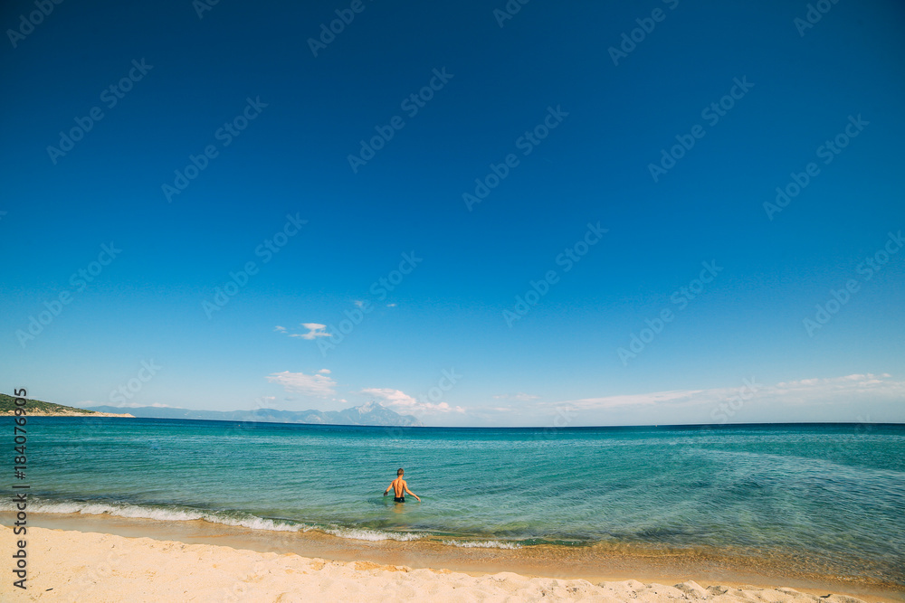 beach on the Mediterranean in a clear sunny day, Greece, Halkidiki. beach on the Mediterranean in a clear sunny day, Greece, Halkidiki.