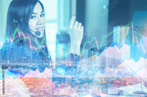 Wallpaper Mural Smiling asian businesswoman using headset against elegane wooden interior room business ideas concept Torontodigital.ca