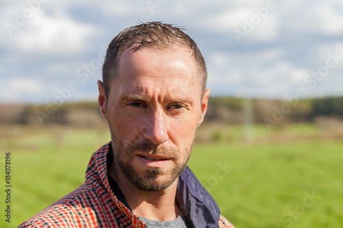 young man with checkered jacket portrait