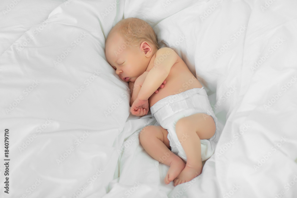 The newborn sleeps. Age 10 days. The newborn sleeps. Age 10 days.