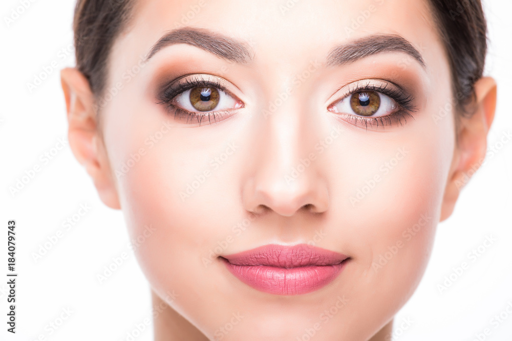 Beautiful Face of Young Woman with Clean Fresh Skin close up isolated on white. Beautiful Spa Woman Smiling. Perfect Fresh Skin. Pure Beauty Model. Youth and Skin Care Concept Beautiful Face of Young Woman with Clean Fresh Skin close up isolated on white. Beautiful Spa Woman Smiling. Perfect Fresh Skin. Pure Beauty Model. Youth and Skin Care Concept
