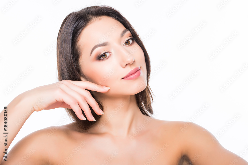 Beautiful elegant young woman with natural nude make up on white background. Professional makeup, perfect skin. Beautiful elegant young woman with natural nude make up on white background. Professional makeup, perfect skin.