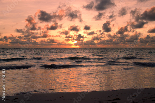 Sunrise on the beach in Punta Cana, Dominican Republic. © ferkhova