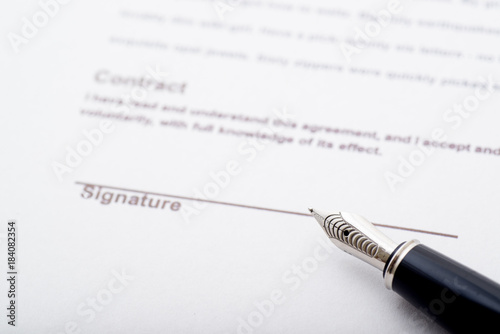 signaure for contract with fountain pen photo