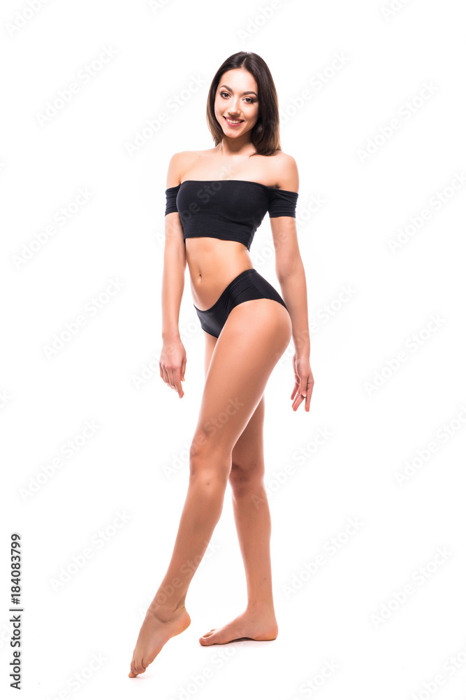 Beautiful Woman with perfect sport body in black underwear isolated on white backgroun. Perfect Body. Full length portrait Beautiful Woman with perfect sport body in black underwear isolated on white backgroun. Perfect Body. Full length portrait