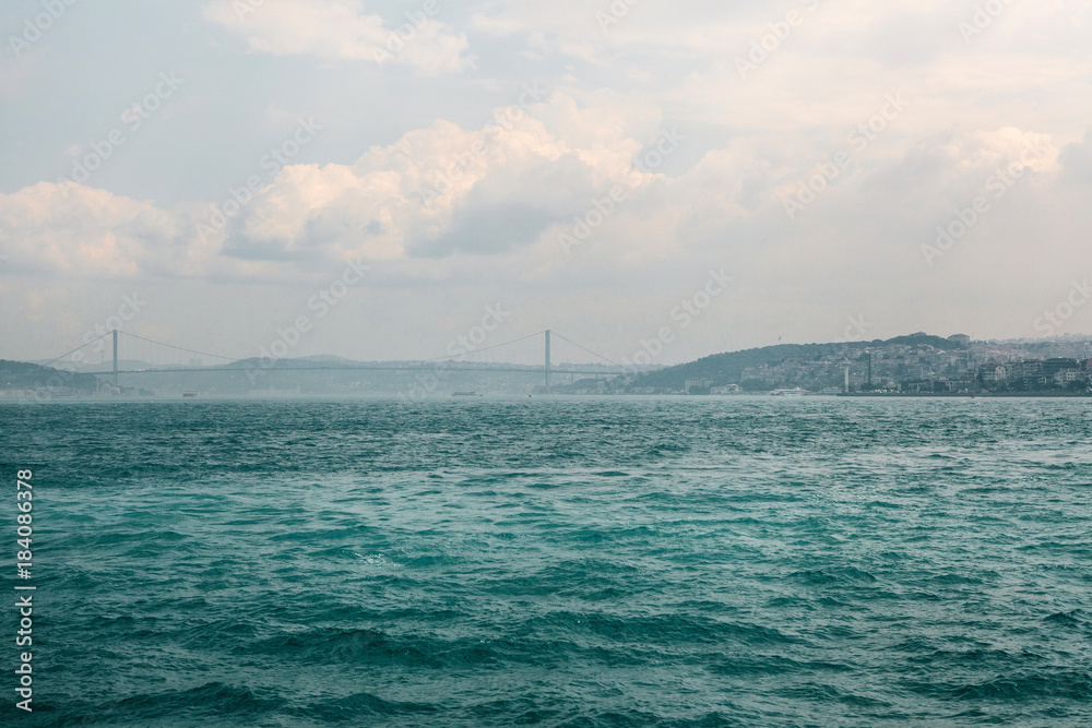 An amazing view of the city, the bridge and the Bosphorus in Istanbul. Travel around Turkey.