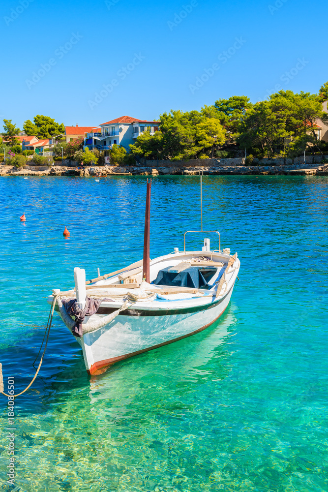 Fishing boat anchoring in beautiful bay with turquoise sea water in Razanj port, Dalmatia, Croatia