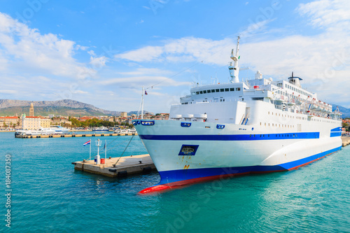 Large ferry ship carrying cars and passengers mooring in Split port, Croatia