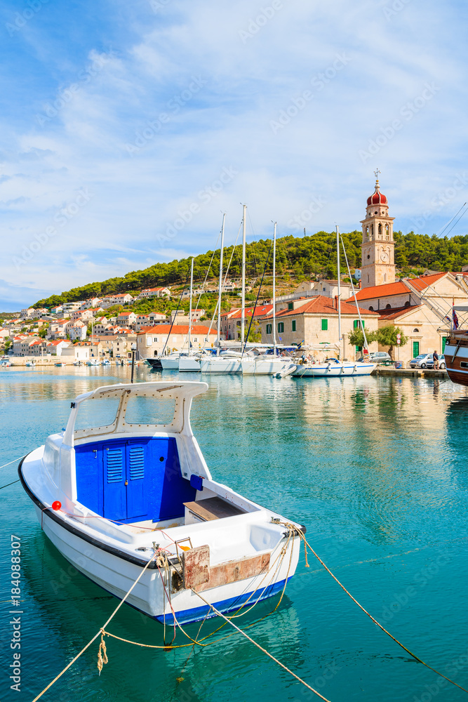 Fishing boat mooring in picturesque Pucisca port, Brac island, Croatia