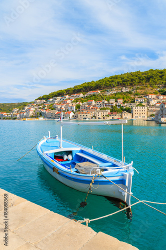 Fishing boat mooring in picturesque Pucisca port, Brac island, Croatia