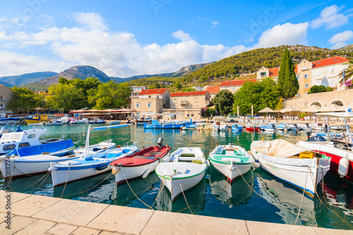 Typical colorful fishing boats in Bol port on Brac island, Dalmatia, Croatia